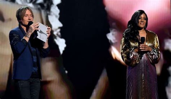 Hosts Keith Urban, left, and Mickey Guyton speak at the 56th annual Academy of Country Music Awards, at the Grand Ole Opry in Nashville, Tenn 2021 Academy of Country Music Awards, Nashville, United States - 18 Apr 2021