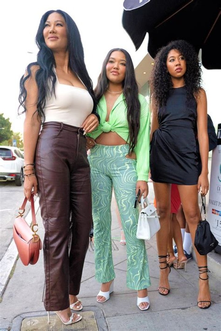 Influencer Ming Lee Simmons arrives for the launch of her collaboration boohoo x Ming Lee Simmons collection at Catch LA in Los Angeles. Ming is wearing a peekaboo cutout pair of summer pants with a matching blouse tied into a knot on the front with white wedge shoes. Ming is joined by her mother Kimora Lee Simmons and sister Aoki Lee Simmons! Pictured: Ming Lee Simmons,Kimora Lee Simmons,Aoki Lee Simmons Ref: SPL5240597 200721 NON-EXCLUSIVE Picture by: Tim Regas / SplashNews.com Splash News and Pictures USA: +1 310-525-5808 London: +44 (0)20 8126 1009 Berlin: +49 175 3764 166 World Rights
