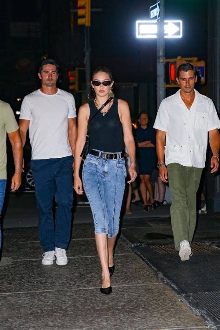 New York, NY - Gigi Hadid looks stylish in a Louis Vuitton bucket hat as she steps out for an afternoon walk with her baby daughter.Pictured: Gigi HadidBACKGRID USA 19 DECEMBER 2020 USA: +1 310 798 9111 / : +44 208 344 2007 / *UK Clients - Pictures Containing ChildrenPlease Pixelate Face Prior To Publication*